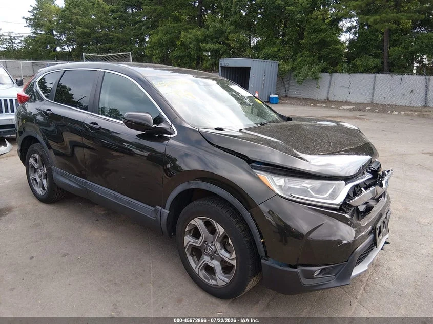 Recorded Honda CR-V, front passenger-side view with hood and bumper damage